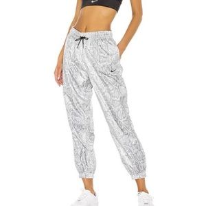 Nike track pants wind pants snakeskin python print drawstring waist size medium